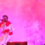 JoeBoy performing live at St. Lucia Jazz Festival 2024.