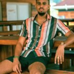 Caribbean Man looking directly into camera lens