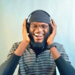 Man enjoying listening to Dancehall Music